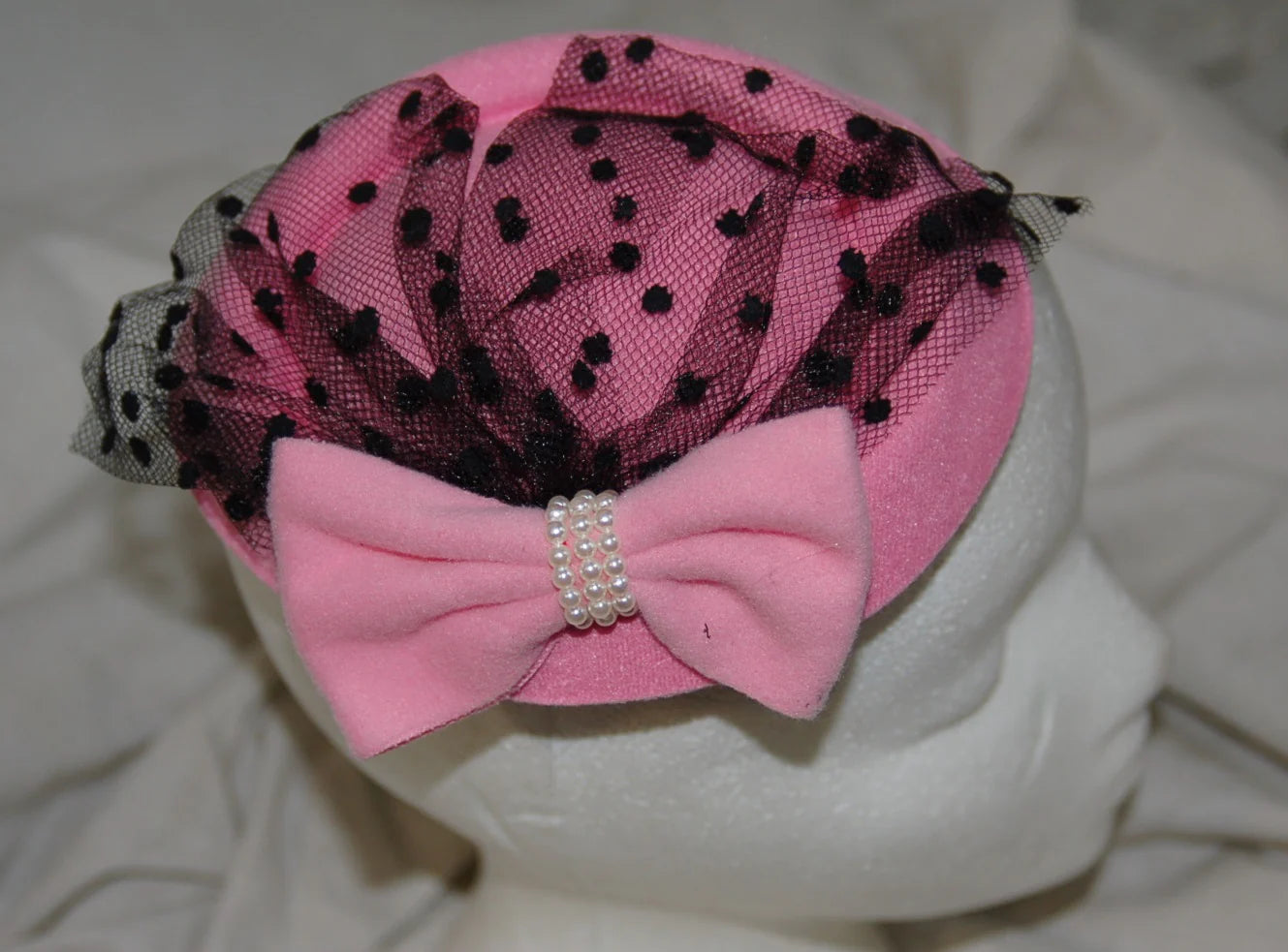 11 pink felt hats