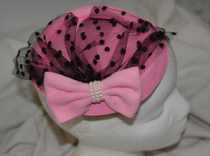 11 pink felt hats