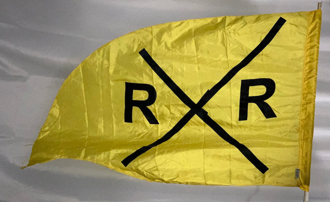 19 yellow railroad crossing flags