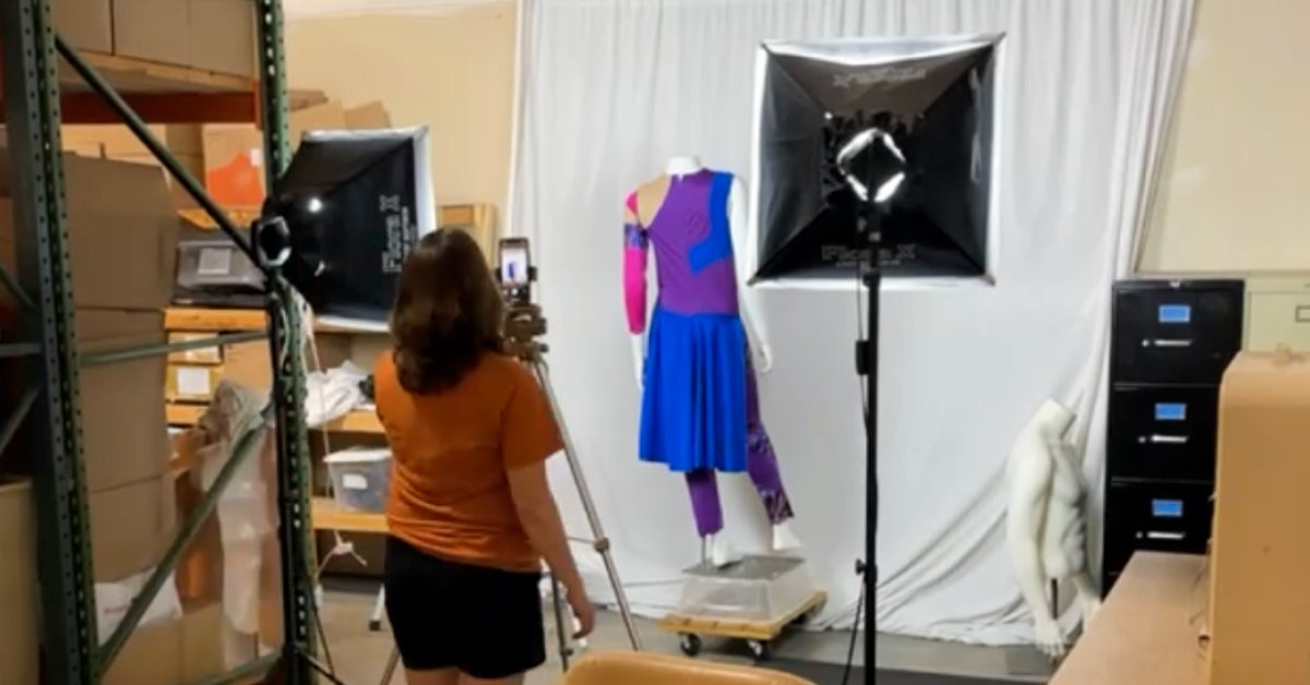 Guard Closet consignment photography setup with mannequin, lighting, shelving and inventory